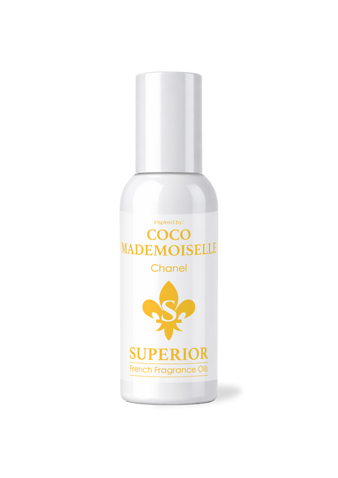 White bottle of 'Coco Mademoiselle' perfume with gold text and logo on a white background